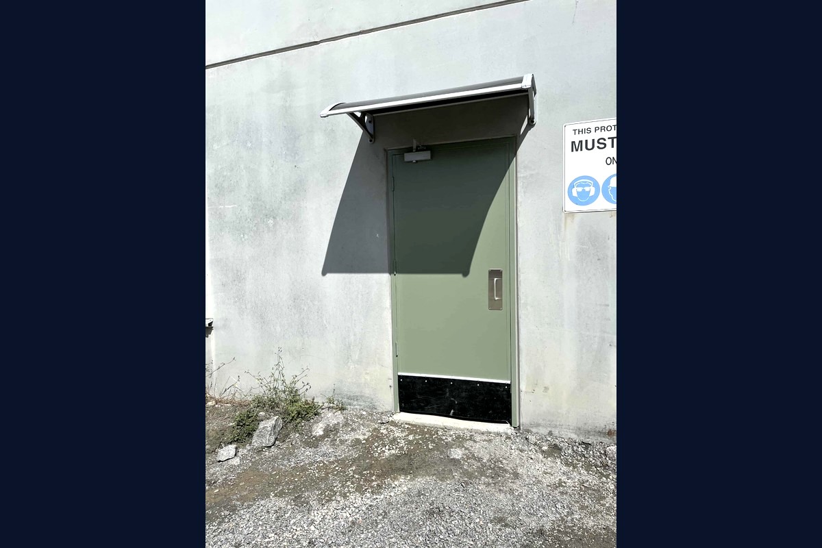 Installation of commercial grade door and awning